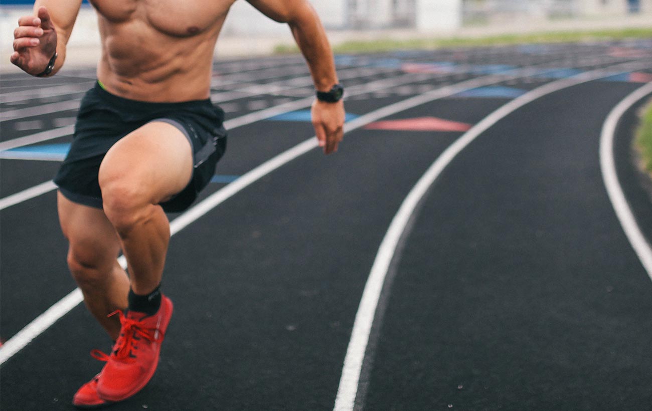 man running on track